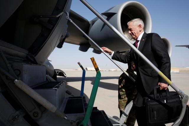 U.S. Defense Secretary James Mattis boards a U.S. Air Force C-17 for a day trip to a U.S. military base in Djibouti from Doha, Qatar April 23, 2017.